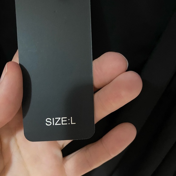 Black bodysuit. NWT never been worn. Size large - Picture 3 of 5